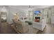 Cozy living room featuring plush seating, a decorative fireplace, and a large screen TV for ultimate comfort at 160 Cherry Grove Dr, Summerville, SC 29483
