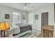 Comfortable bedroom with cozy blanket, hardwood floors, and decorative lamp at 1600 Long Grove Drive # 811, Mount Pleasant, SC 29464
