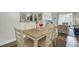 Dining room adjacent to living room featuring a wooden table and seating for six at 1600 Long Grove Drive # 811, Mount Pleasant, SC 29464