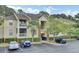 Inviting condo exterior boasting two stories, quaint balconies, lush landscaping, and convenient parking at 1600 Long Grove Drive # 811, Mount Pleasant, SC 29464