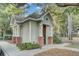 Charming community building with brick accents and inviting entrance, nestled among mature trees at 1600 Long Grove Drive # 811, Mount Pleasant, SC 29464