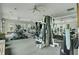 Bright gym featuring an elliptical machine, weight machines, and a mirrored wall at 1600 Long Grove Drive # 811, Mount Pleasant, SC 29464