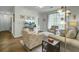 Inviting living area featuring stylish seating, a television, and an open layout at 1600 Long Grove Drive # 811, Mount Pleasant, SC 29464