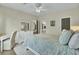 Bright bedroom with accent pillows, ceiling fan, and a view of the bathroom entrance at 1600 Long Grove Drive # 811, Mount Pleasant, SC 29464