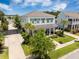 A beautiful home featuring lovely landscaping, a side-entry two car garage, and a luscious front yard at 169 Callibluff Dr, Summerville, SC 29486