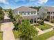 Desirable home boasts a manicured lawn, lush landscaping, inviting curb appeal and side entry two-car garage at 169 Callibluff Dr, Summerville, SC 29486