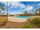Community pool with multiple lap lanes, zero entry access, and poolside lounging under a bright blue sky at 169 Callibluff Dr, Summerville, SC 29486