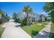 Charming two-story home with a landscaped yard and inviting front porch at 169 Callibluff Dr, Summerville, SC 29486