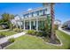 Charming two-story home with a landscaped yard and inviting front porch at 169 Callibluff Dr, Summerville, SC 29486