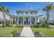 Beautiful two-story home with a charming front porch, well-maintained landscaping, and inviting curb appeal at 169 Callibluff Dr, Summerville, SC 29486