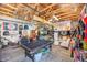 Finished garage with sports themed decor, pool table, and seating at 169 Callibluff Dr, Summerville, SC 29486