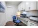 Bright home office with built-in desk and cabinets, perfect for remote work at 169 Callibluff Dr, Summerville, SC 29486