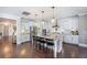 Modern kitchen with white cabinets, stainless steel appliances, a granite island, and pendant lighting features at 169 Callibluff Dr, Summerville, SC 29486