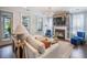 Cozy living room with fireplace, modern furnishings, and plenty of natural light at 169 Callibluff Dr, Summerville, SC 29486