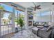 Enclosed patio featuring comfortable seating, a fireplace, and scenic views, great for relaxation at 169 Callibluff Dr, Summerville, SC 29486
