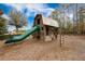 Fun wooden playground structure featuring a slide and swing set for hours of imaginative play at 169 Callibluff Dr, Summerville, SC 29486