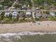 Stunning aerial view of the house near the beach, showing proximity to the ocean at 1701 A Palmetto Blvd, Edisto Island, SC 29438