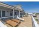 Spacious deck perfect for outdoor lounging, complete with comfortable lounge chairs and views at 1701 A Palmetto Blvd, Edisto Island, SC 29438