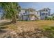 Charming beach house with a well-maintained yard, perfect for outdoor activities and relaxation at 1701 A Palmetto Blvd, Edisto Island, SC 29438
