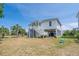 Inviting coastal home with stairs and ample ground-level space, perfect for beachside living at 1701 A Palmetto Blvd, Edisto Island, SC 29438