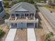 Inviting exterior featuring a spacious deck and outdoor seating perfect for enjoying coastal views at 1701 A Palmetto Blvd, Edisto Island, SC 29438