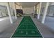 Relaxing ground level featuring a custom shuffleboard perfect for outdoor entertaining at 1701 A Palmetto Blvd, Edisto Island, SC 29438