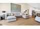 Bright living room with comfortable seating, stylish decor, and access to the kitchen at 1701 A Palmetto Blvd, Edisto Island, SC 29438