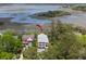 Expansive aerial view showcasing the property's lush green landscaping and proximity to the marsh at 1801 Landfall Way, Seabrook Island, SC 29455
