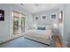 Tranquil bedroom featuring a soft color palette, French doors, and natural light at 1801 Landfall Way, Seabrook Island, SC 29455