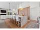 Open kitchen layout with large island and living room in the background at 1801 Landfall Way, Seabrook Island, SC 29455