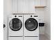 Convenient laundry room featuring a washer, dryer and wash sink at 1801 Landfall Way, Seabrook Island, SC 29455