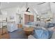 Large living room with modern décor including vaulted ceilings and an open concept layout at 1801 Landfall Way, Seabrook Island, SC 29455