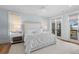 Serene main bedroom featuring private balcony access and tranquil marsh views at 1801 Landfall Way, Seabrook Island, SC 29455