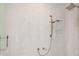 Modern shower featuring a rainfall shower head, handheld sprayer and built-in shelving at 1801 Landfall Way, Seabrook Island, SC 29455