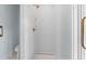 Modern bathroom with white tile shower and a comfortable seating area at 1801 Landfall Way, Seabrook Island, SC 29455