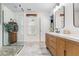 Elegant bathroom with a glass shower, double vanity, and modern design elements at 1817 Towne St, Johns Island, SC 29455