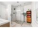 Stylish bathroom with a glass shower, decorative shelves, and modern fixtures at 1817 Towne St, Johns Island, SC 29455