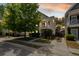 Charming two-story home featuring a front porch and well-manicured landscaping at 1817 Towne St, Johns Island, SC 29455