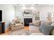 Cozy living room features a fireplace, hardwood floors, and comfortable seating at 1817 Towne St, Johns Island, SC 29455