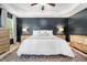 Bedroom features a tray ceiling, a wood accent wall and ample natural light at 1817 Towne St, Johns Island, SC 29455