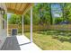 Spacious backyard with a covered patio and privacy fence, perfect for outdoor entertaining at 1917 Jason St, North Charleston, SC 29406