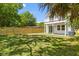 Lush backyard with a privacy fence, view of the house, perfect for outdoor activities and relaxation at 1917 Jason St, North Charleston, SC 29406