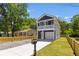 Stylish two-story home showcasing its modern design and well-kept exterior and beautiful landscaping at 1917 Jason St, North Charleston, SC 29406