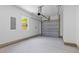 Clean and bright garage interior with a functional layout and ample space for parking and storage at 1917 Jason St, North Charleston, SC 29406