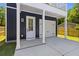 Attached garage and covered entrance, providing convenient access and protection from the elements at 1917 Jason St, North Charleston, SC 29406