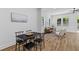 Bright and airy living room and dining area with wood floors, natural light, and modern furnishings at 1917 Jason St, North Charleston, SC 29406