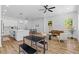 Bright open concept with modern decor, featuring hardwood floors and large windows for lots of natural light at 1917 Jason St, North Charleston, SC 29406