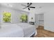 Bright bedroom with an ensuite bath, natural light, and hardwood floors for a cozy living experience at 1917 Jason St, North Charleston, SC 29406