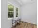 Cozy office space with natural light, hardwood floors, and a modern desk for a comfortable workspace at 1917 Jason St, North Charleston, SC 29406