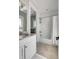 Bathroom featuring white subway tile, a shower and tub combo, and a white vanity with granite countertops at 2 Piedmont Ave # A, Charleston, SC 29403